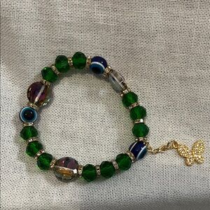 Chic Green Beaded Bracelet with Gold Butterfly Accent